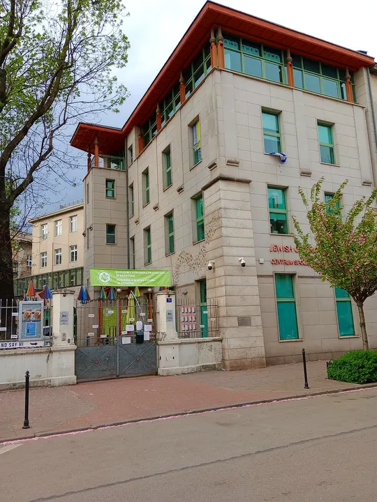 Green window frames on the building at Jewish Community Centre, Kraków