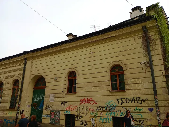 Low yellow frontage beside the square at Jewish Culture Centre, Kraków