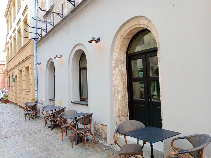 Tables beside the street frontage at Kazimierz Jewish heritage trail