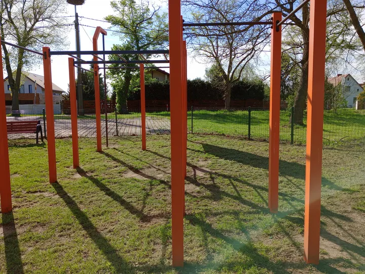 Low bars along the grass at Kiełpin outdoor exercise ground
