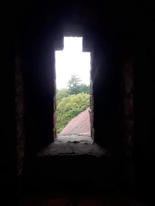 Narrow opening in the tower wall at Knights Hospitaller Castle, Łagów
