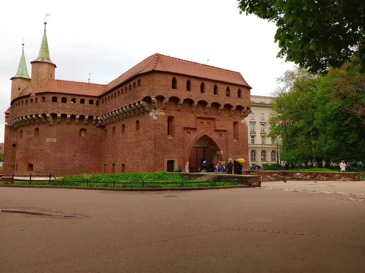 The Barbican seen from the park path at Kraków Barbican