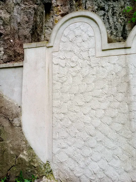 Surviving wall with its rounded profile at Kraków ghetto wall