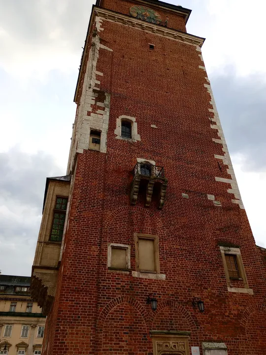 The tall brick shaft from below at Kraków Town Hall Tower