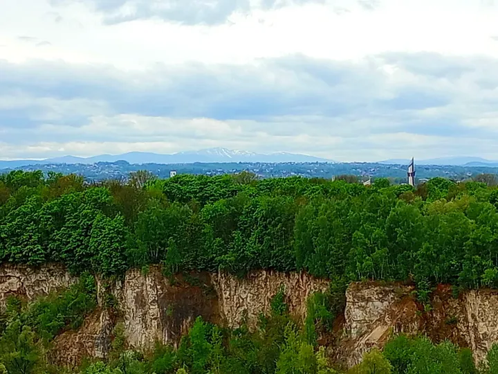Wooded hills and the distant skyline at Krakus Mound