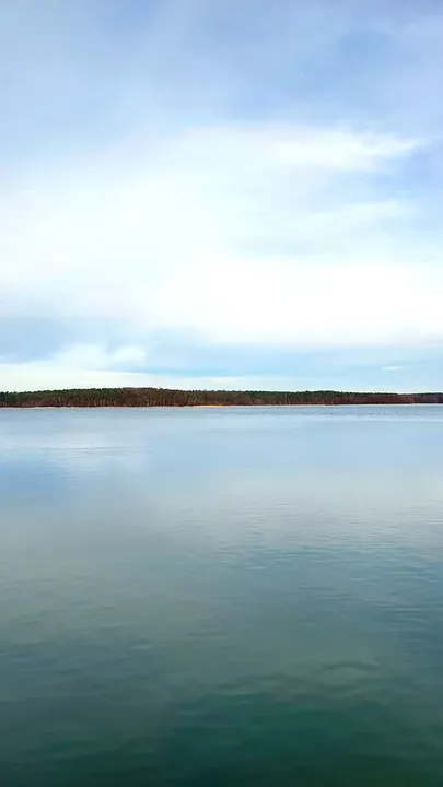 Blue water across the winter lake at Lake Niesłysz