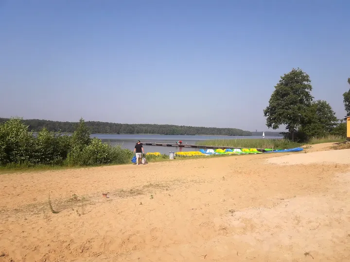 The sandy beach beside the lake at Lake Sławskie