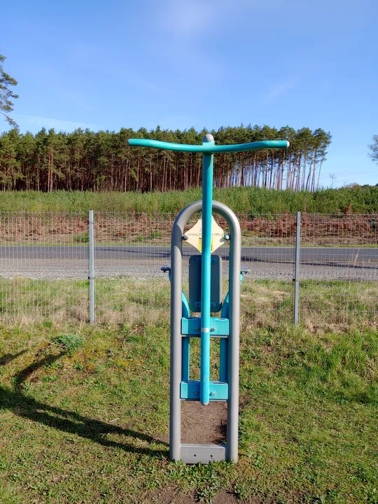 Turquoise workout machine at Łężyca outdoor exercise ground