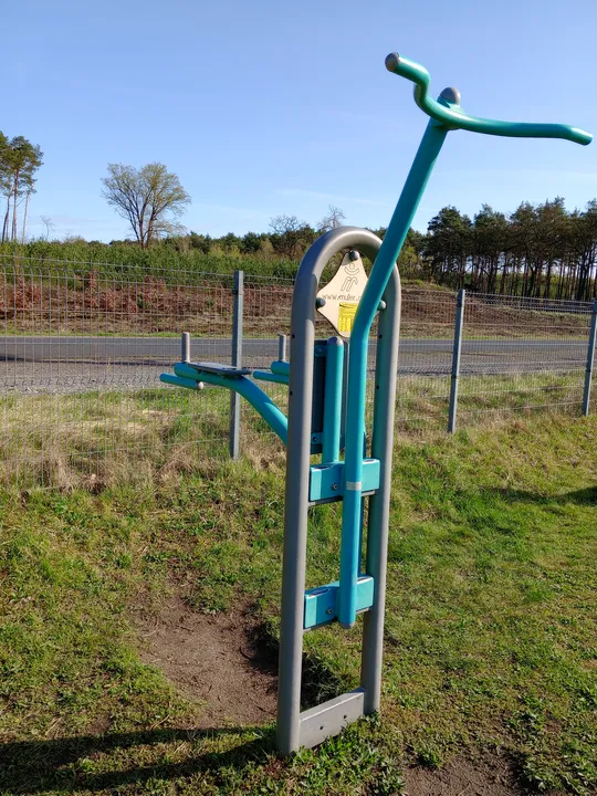 Tall machine beneath the blue sky at Łężyca outdoor exercise ground