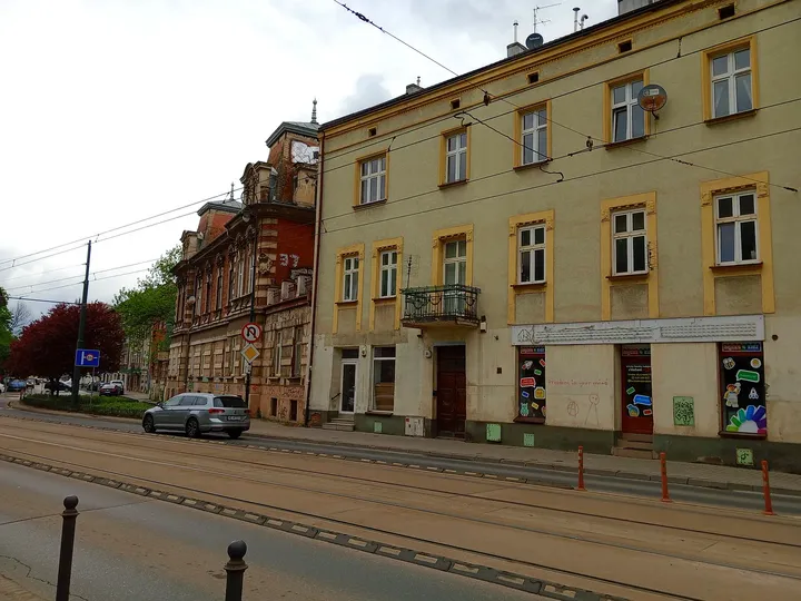 Tram tracks past the older frontages at Limanowskiego Street