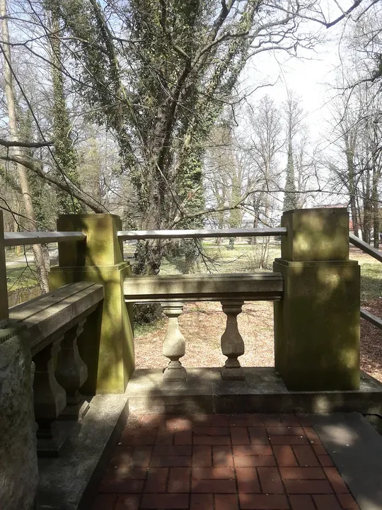 Stone railings beside the garden path at Manor Park, Iłowa