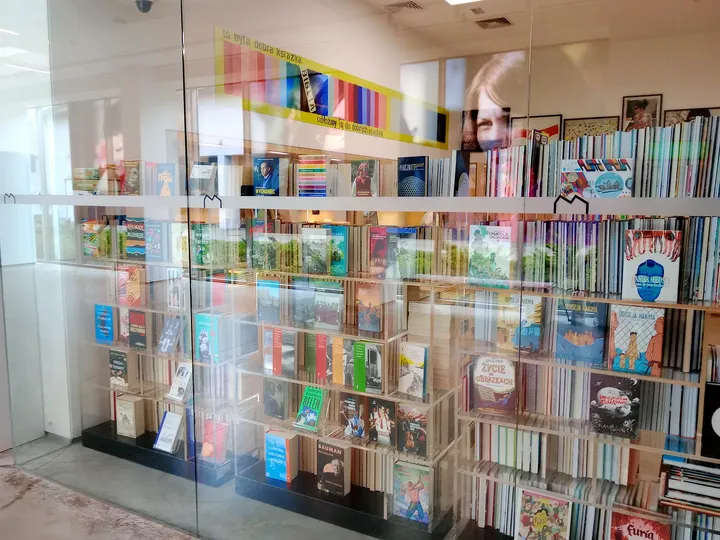 Books displayed inside the museum shop at MOCAK contemporary art museum