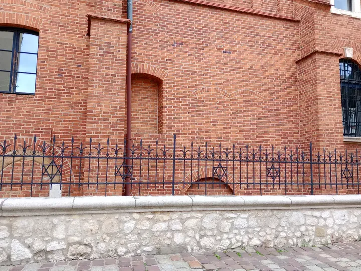 The stone base beneath the brickwork at Old Synagogue, Kraków