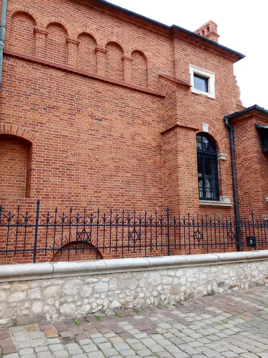 The brick side wall and roofline at Old Synagogue, Kraków