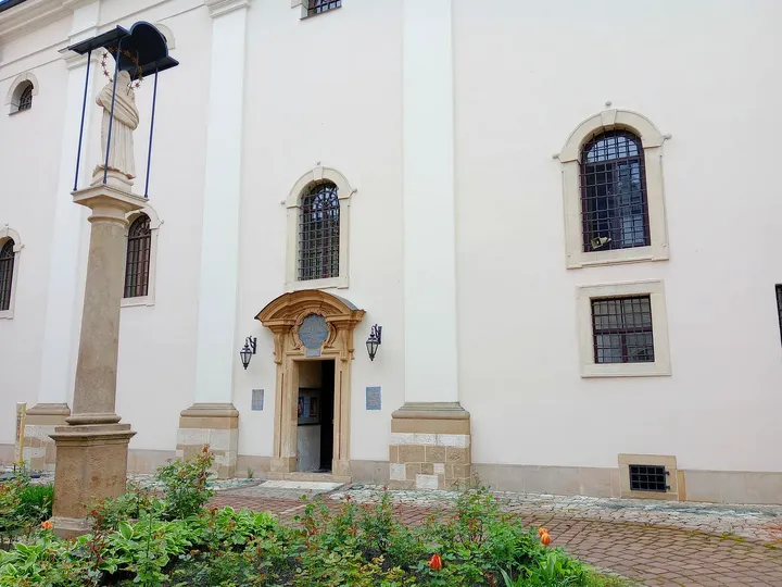 The church façade and its planting at Our Lady of the Snows Church, Kraków
