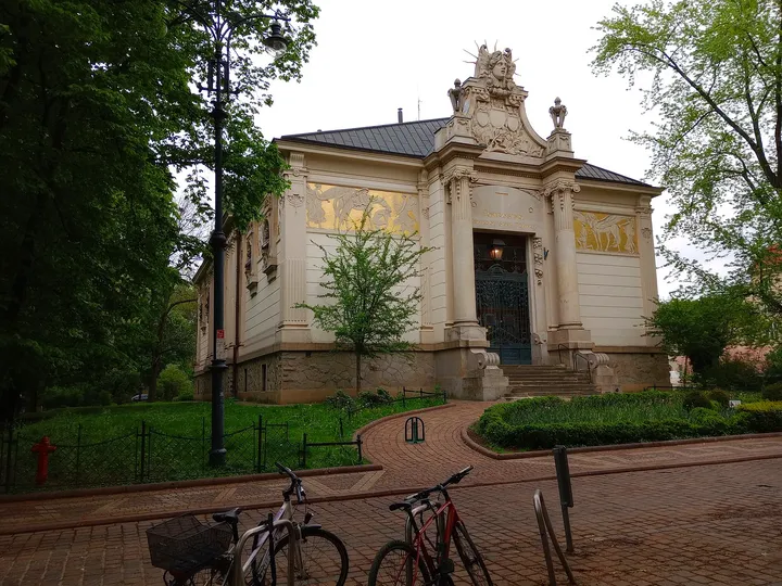 Palace of Art entrance beside the trees at Palace of Art, Kraków