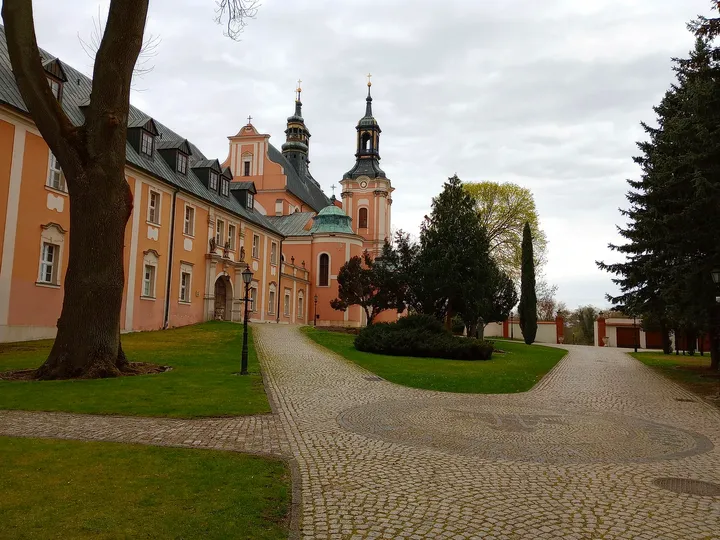 The brick monastery wing and church towers at Paradyż monastery and seminary