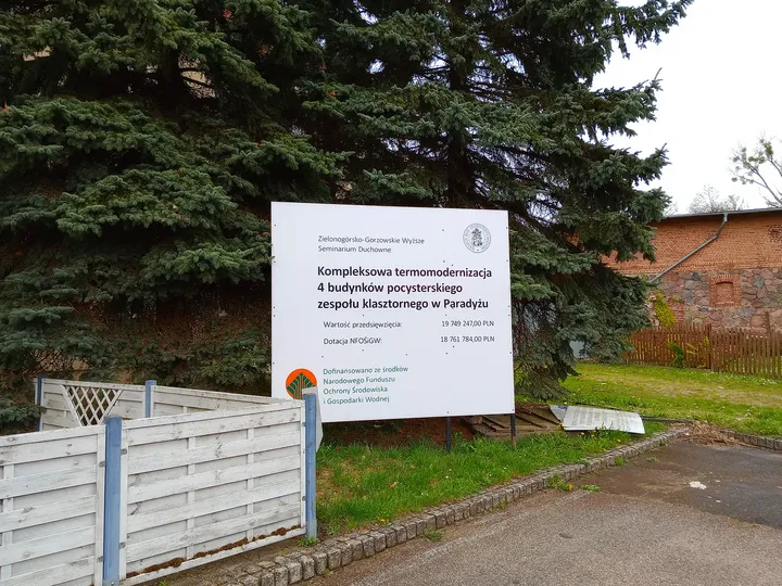 A notice board at the entrance at Paradyż monastery and seminary