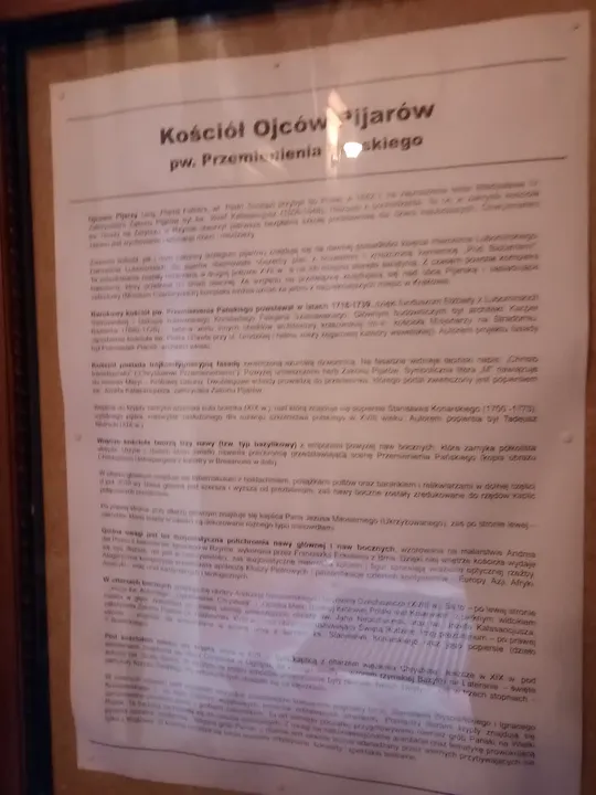 An explanatory panel inside the church at Piarist Church of the Transfiguration