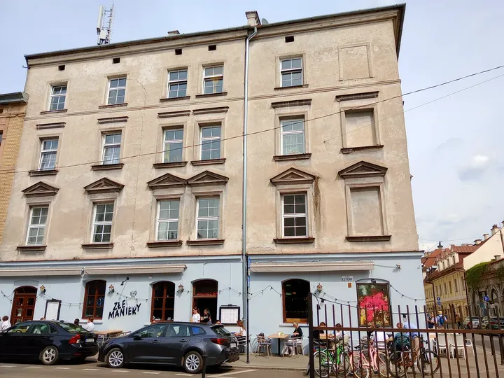 Upper windows above the market street at Plac Nowy, Kazimierz