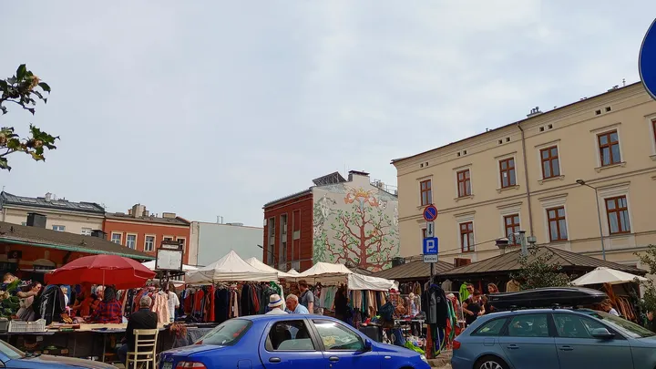 People beside the market stalls at Plac Nowy, Kazimierz