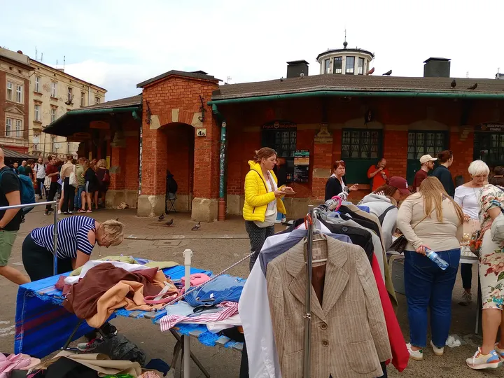 Clothing stalls beside the market hall at Plac Nowy, Kazimierz