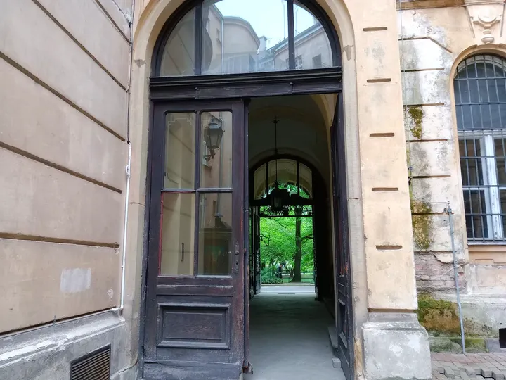 A doorway opening towards the park at Planty beside Pijarska Street