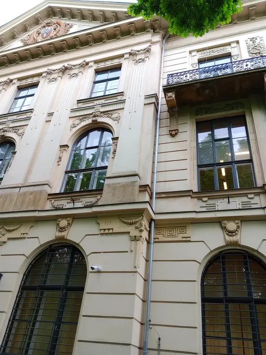 Upper windows above the pavement at Planty beside Pijarska Street