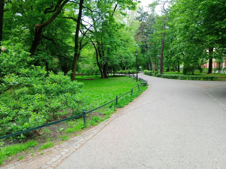 The park path around its planted edge at Planty beside Pijarska Street