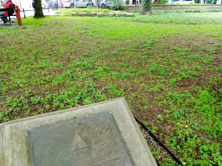 A stone border beside the planting at Planty: Station Garden