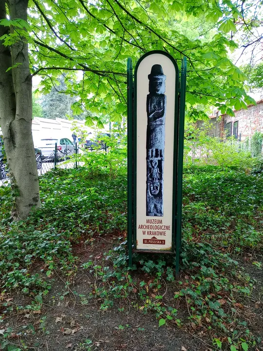 A narrow commemorative marker at Planty: Wawel Garden