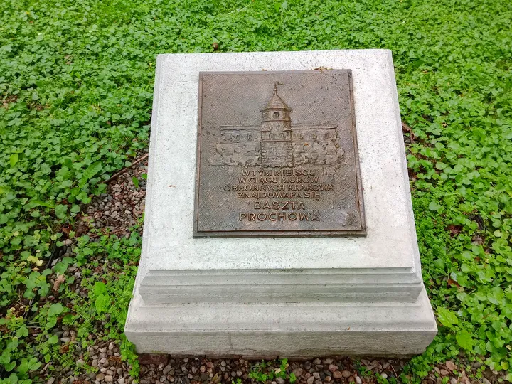 A memorial plaque beside the avenue at Planty: Wawel Garden