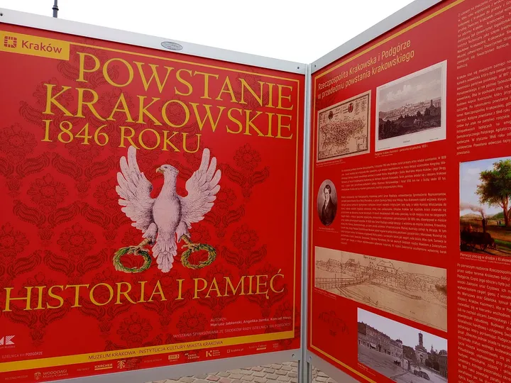 A history exhibition board in the square at Podgórze Market Square