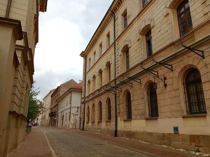 The long stone-fronted building at Poselska Street
