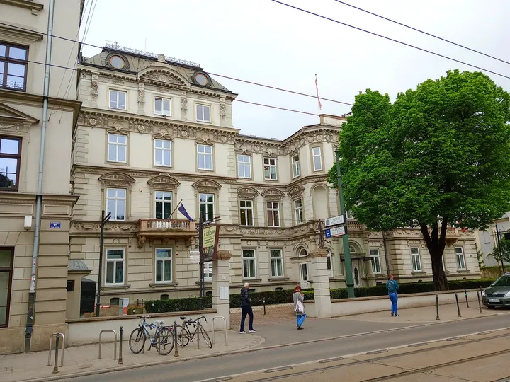 Building corner beneath the overhead wires at Puget Palace