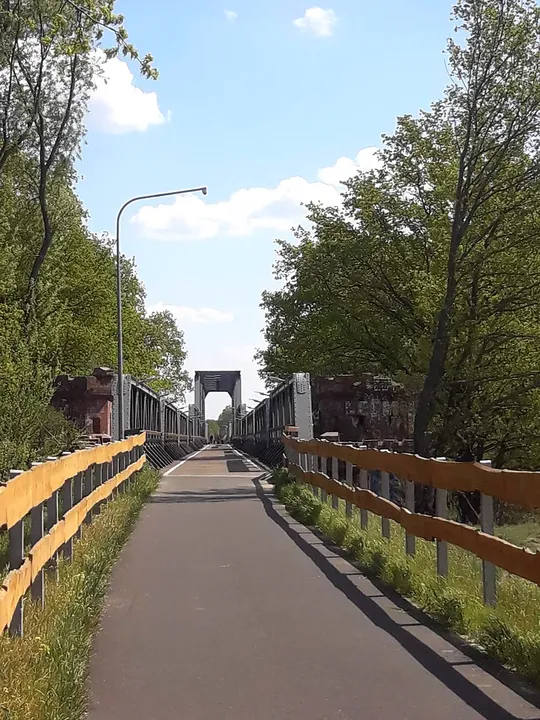 Route beside buildings at the approach at Railway cycling route at Stany
