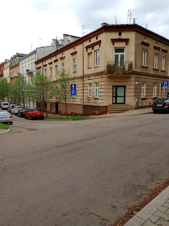 Townhouses lining the narrow road at Rękawka hillside