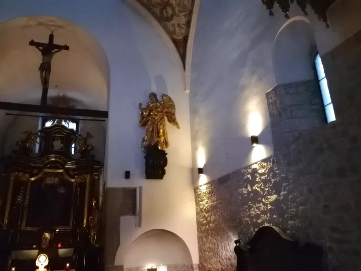 Altar and pews in the small interior at Saint Adalbert’s Church, Kraków