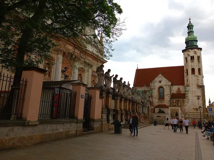 Church frontage beside a busy pavement at Saint Andrew’s Church, Kraków