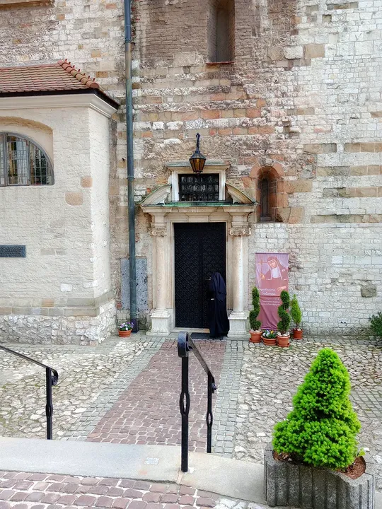 Stone doorway in the church wall at Saint Andrew’s Church, Kraków