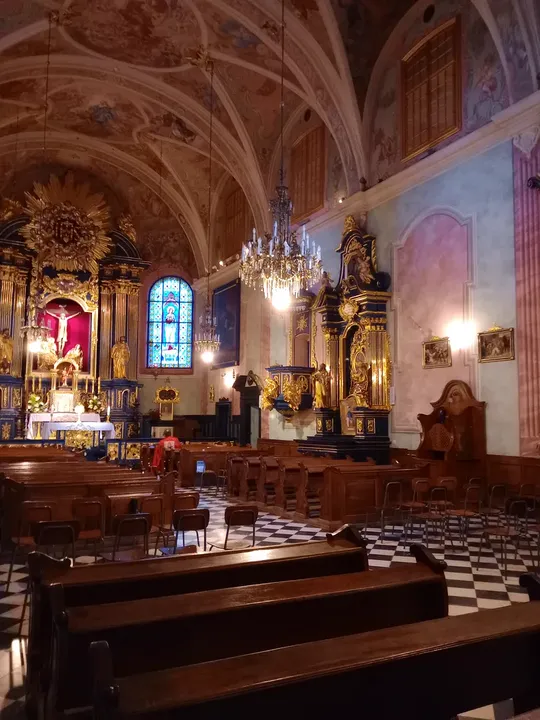 The church interior beyond the pews at Saint Barbara’s Church, Kraków