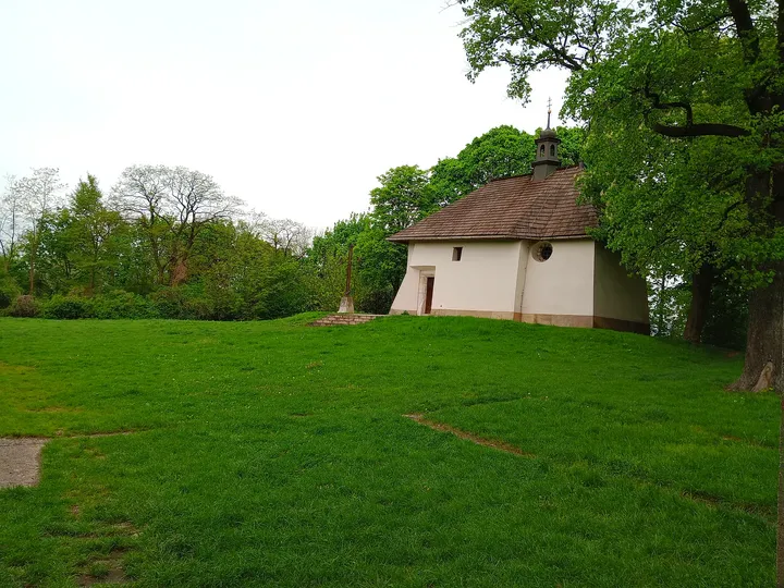A broad view of the church and lawn at Saint Benedict’s Church, Kraków