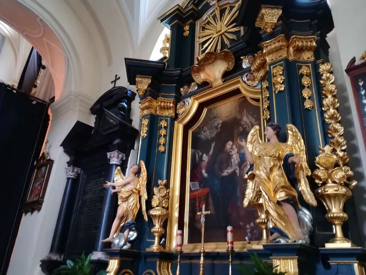 Dark and gilded altar carving at Saint Bernardine of Siena Church