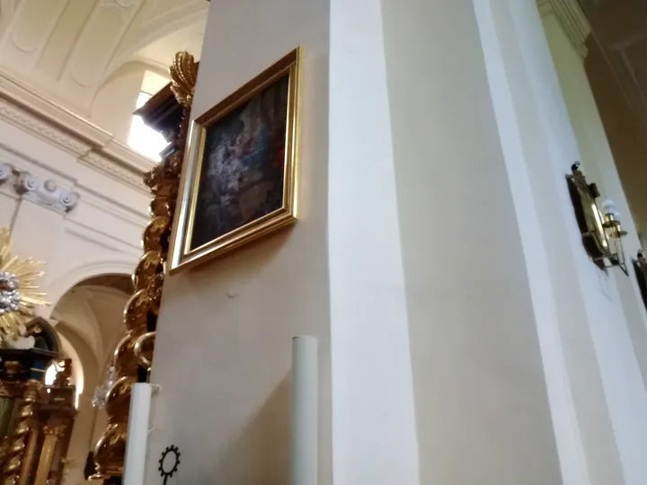 Painting above a side doorway at Saint Bernardine of Siena Church
