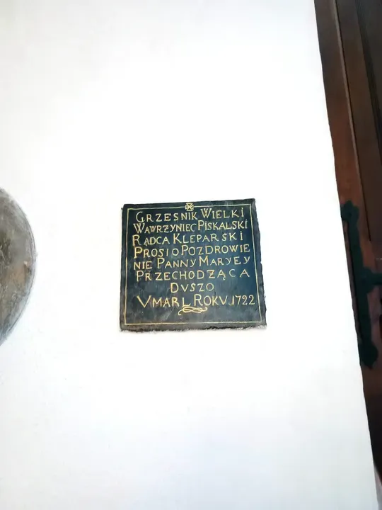 Inscribed stone plaque at Saint Florian’s Church, Kraków