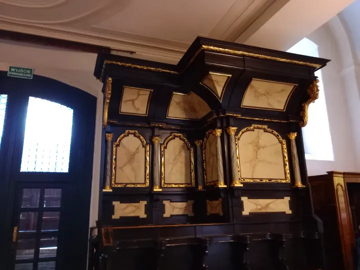 Wooden organ console and keyboards at Saint Florian’s Church, Kraków