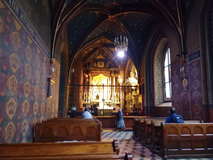 The central aisle towards the altar at Saint Francis of Assisi Basilica, Kraków