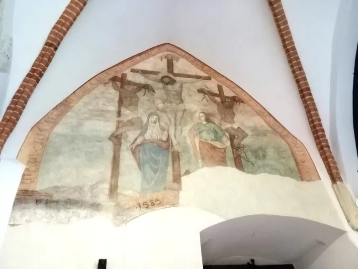 A painted fragment above a doorway at Saint Francis of Assisi Basilica, Kraków