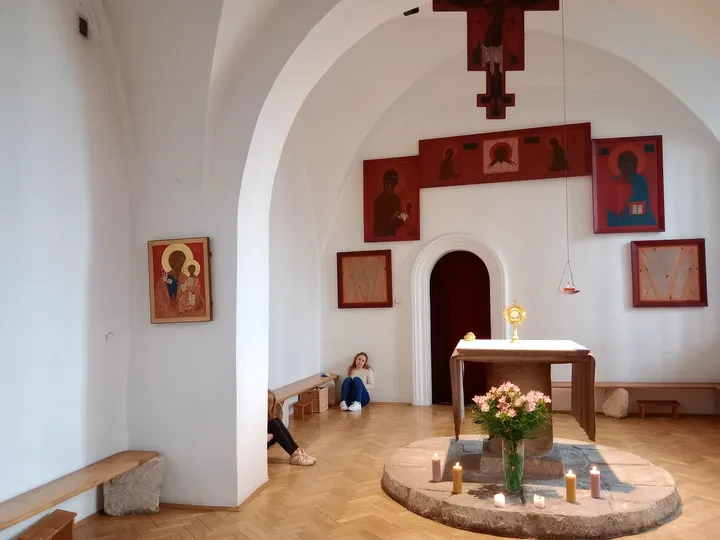 A small altar beneath a cross at Saint Hyacinth’s shrine