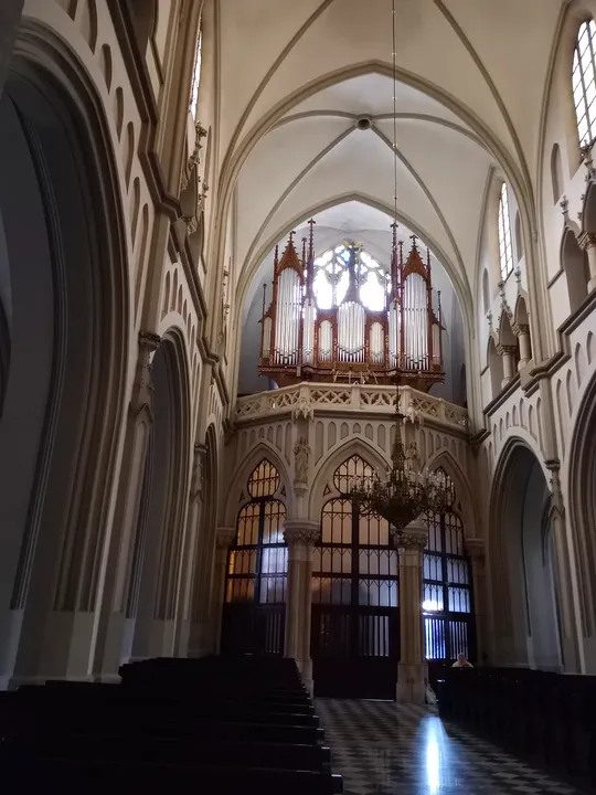 The central aisle towards the rear window at Saint Joseph’s Church, Podgórze